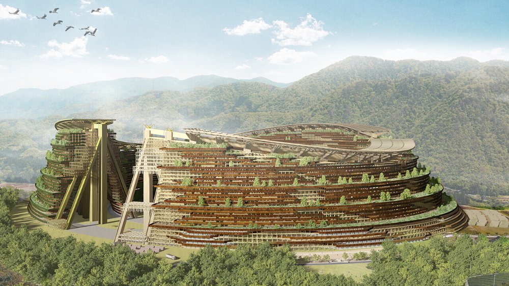 山あいに建つ、緑に覆われた段々の木造建築群